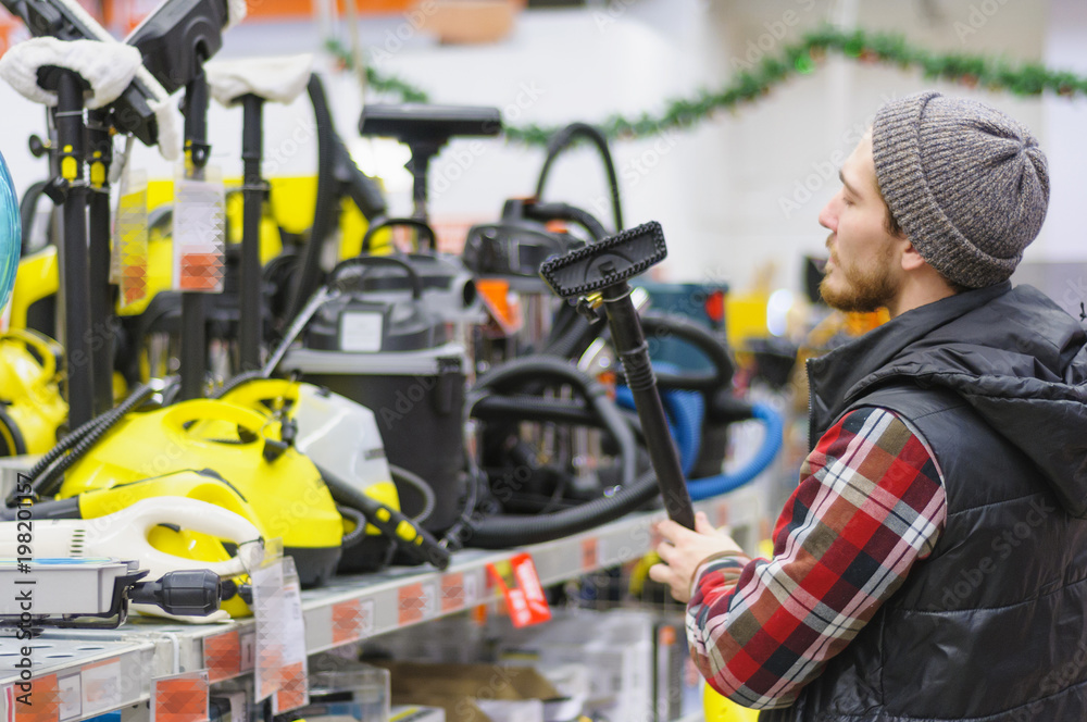 Man in a hardware store Man in a hardware store