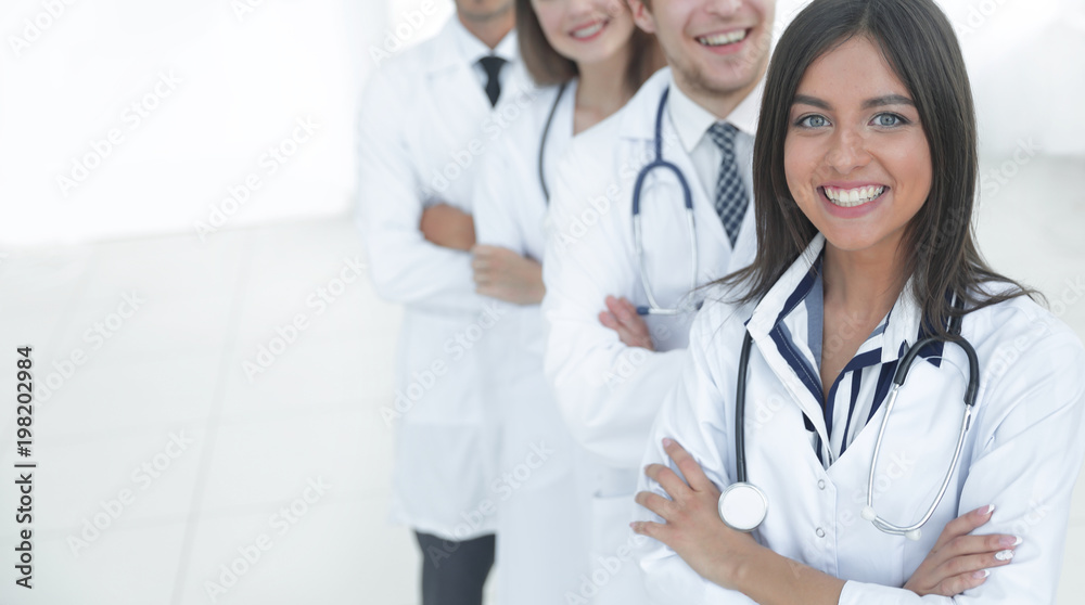 female doctor with group of happy successful colleagues female doctor with group of happy successful colleagues