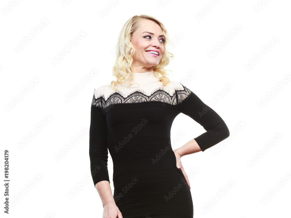 Mid aged woman in stylish black dress Mid aged woman in stylish black dress
