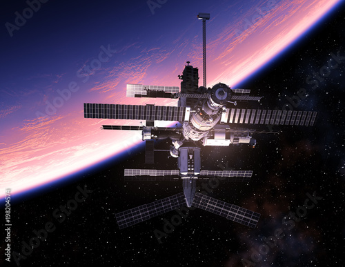 Fototapeta Naklejka Na Ścianę i Meble -  Space Station Orbiting Blue Planet
