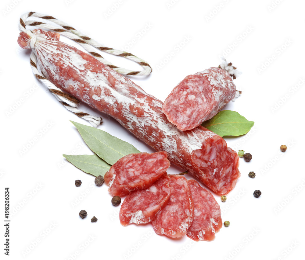 Dried organic salami sausage on white background Dried organic salami sausage on white background