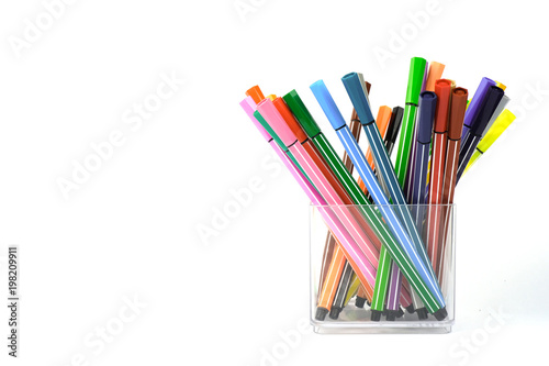 Colorful pens in clear plastic