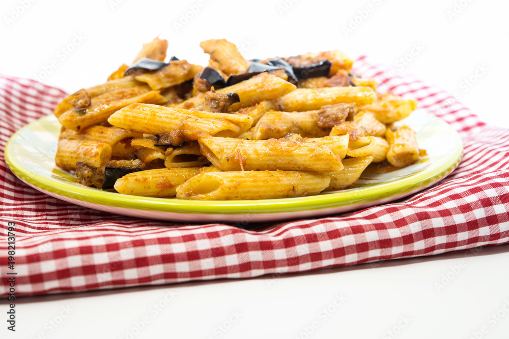 Spaghetti with aubergine and tomato sauce on a the table Spaghetti with aubergine and tomato sauce on a the table