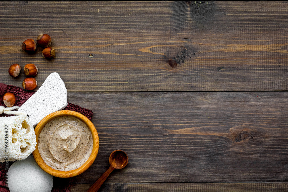 Homemade spa with organic scrub and hazelnut on wooden background top view space for text Homemade spa with organic scrub and hazelnut on wooden background top view space for text