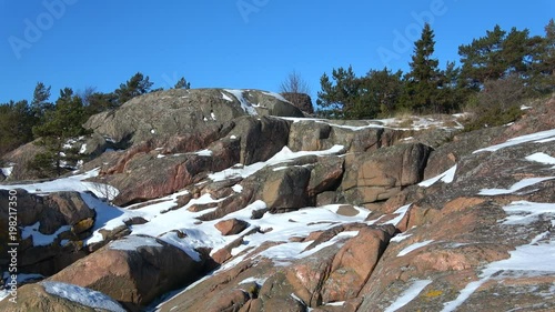 Sunny February day on the rocks of the Hanko Peninsula. Finland photo