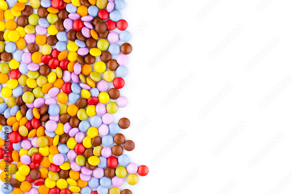 Obraz premium Chocolate Colorful candies white space text