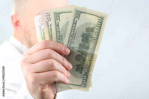 hand man holding money close up.