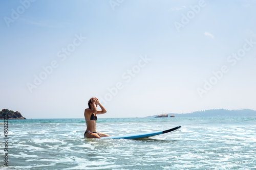 woman on the surfboard