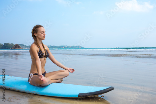 Woman meditating in lotus