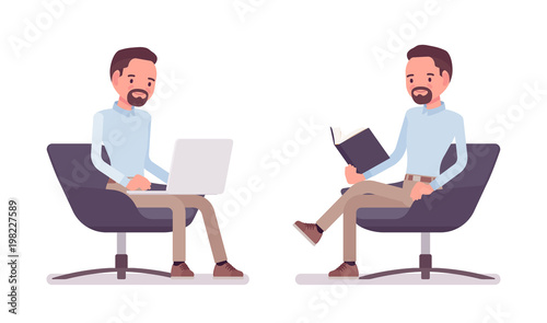 Smart casual man sitting in armchair