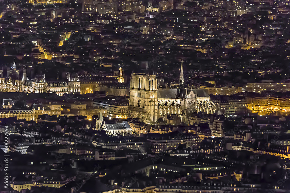 Aerial view of Notre-Dame Cathedral in Paris at night