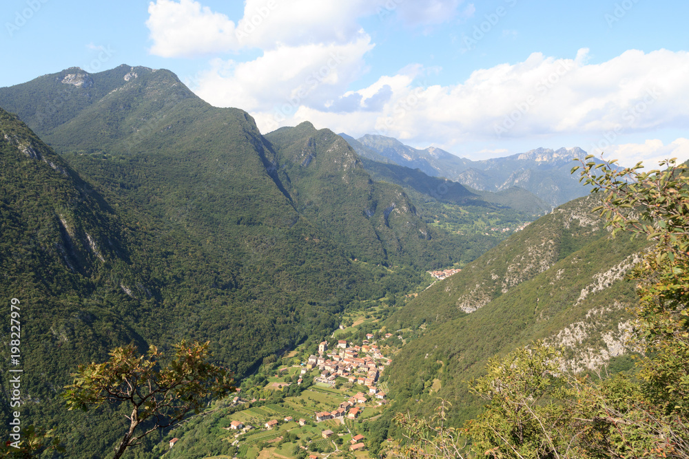 Townscape of village Biacese with mountain panorama near Lake Garda, Italy