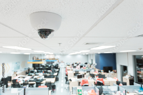 CCTV or surveillance operating in office building blur background.