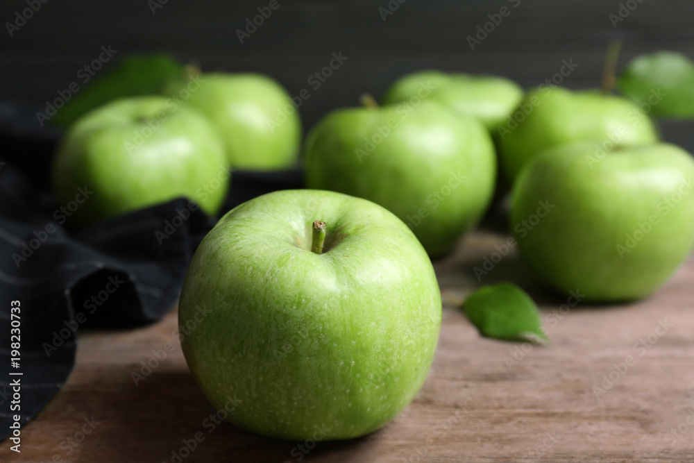 Fresh green apples on wooden table Fresh green apples on wooden table