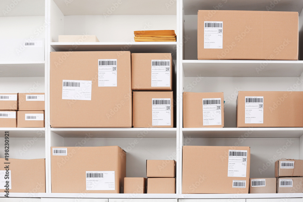 Shelves with parcels ready for shipment to client in home office Shelves with parcels ready for shipment to client in home office