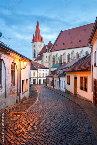 Old paved street in the historical downtown on a winter evening. Town of Znojmo  Czech Republic.