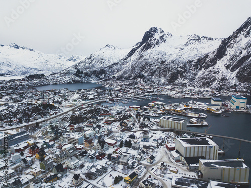 Beautiful super wide-angle winter snowy view of Svolvaer, Norway, Lofoten Islands, with skyline, mountains, Austvagoya island, Vagan municipality, Nordland, Northern Norway photo