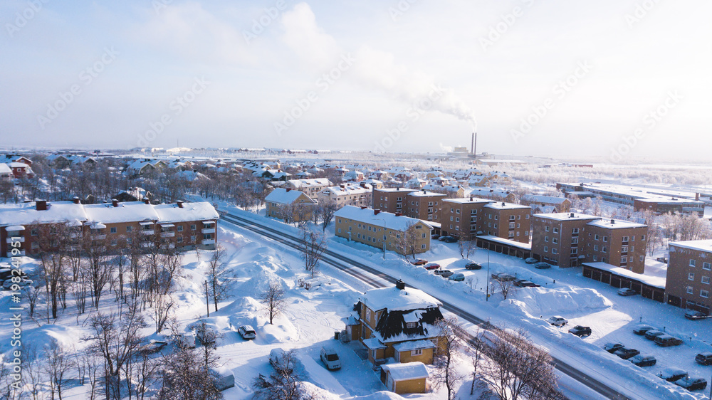 Aerial winter view of Kiruna, the northernmost town in Sweden, province of Lapland, winter sunny picture shot from drone Aerial winter view of Kiruna, the northernmost town in Sweden, province of Lapland, winter sunny picture shot from drone