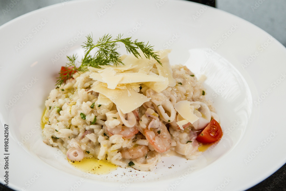 Close up of a risotto with vegetables and shrimps Close up of a risotto with vegetables and shrimps