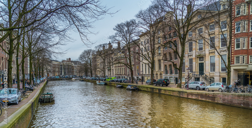 Amsterdam, The Netherlands, March 10th 2018: overlook of a canal, the Keizersgracht, in the centre of Amsterdam