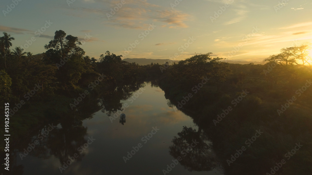 AERIAL: Flying over calm marsh in dense tropical rainforest on Fiji island. AERIAL: Flying over calm marsh in dense tropical rainforest on Fiji island.