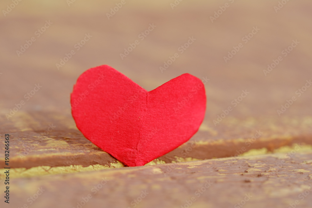 Fototapeta premium Valentines day red heart on old wood. Holidays card