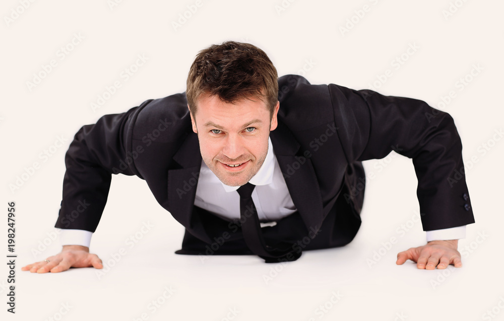 young businessman being wrung out from a floor young businessman being wrung out from a floor