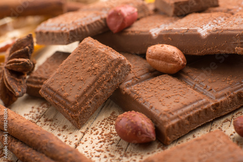 Milk chocolate with nuts, and spices. Macro