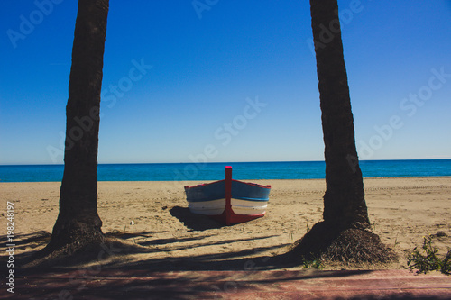 Boat. Lonely boat on the beach in Estepona.