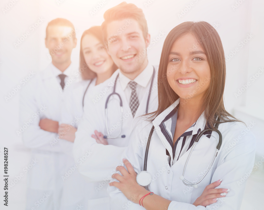 female doctor with group of happy successful colleagues female doctor with group of happy successful colleagues
