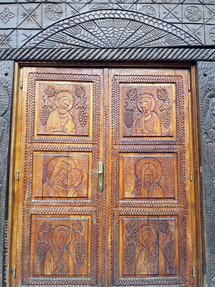Church door carved in wood