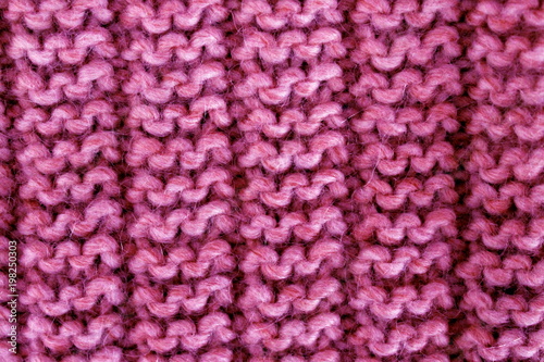 Hand-knit pink yarn texture. © msmyth