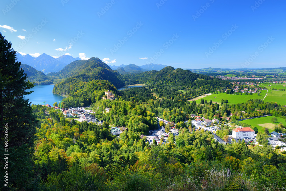 Famous Hohenschwangau Castle on a rugged hill above the village of Hohenschwangau near Fussen in southwest Germany
