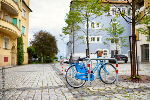 Blue bicycle parked on the street of Lindau, Germany