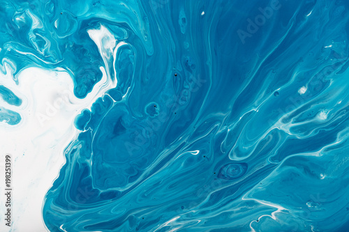Abstract texture, a mixture of paint and oil. Background.