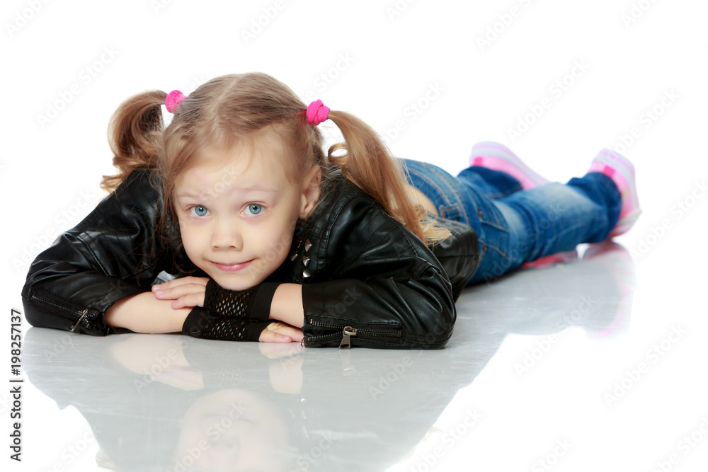 Little girl lies on the floor Little girl lies on the floor