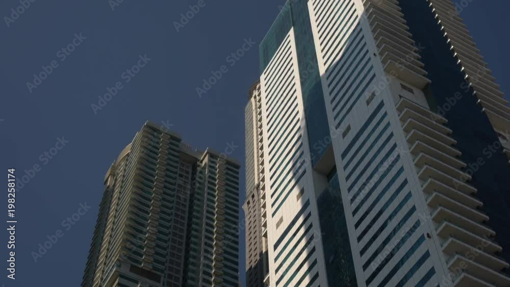 Tilt down view of towers in Dubai Tilt down view of towers in Dubai