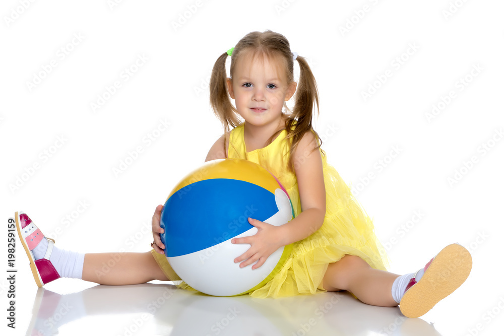 Little girl is sitting on the floor. Little girl is sitting on the floor.
