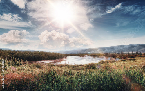 Tranquil evening at lake. Sunset at Dojran lake, FYR Macedonia. photo