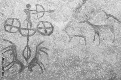 An image of an ancient man's hunting on the wall of a cave. archeology. history of antiquities