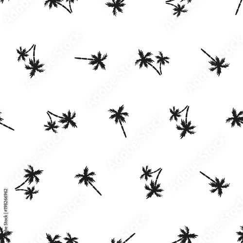 Seamless pattern of small black palm trees on a white background