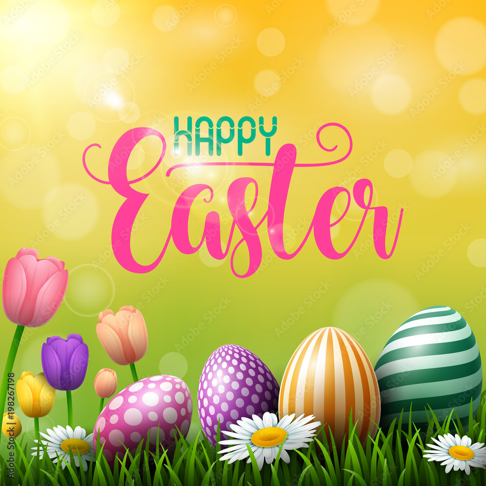 Happy Easter eggs with tulip flowers on meadow background