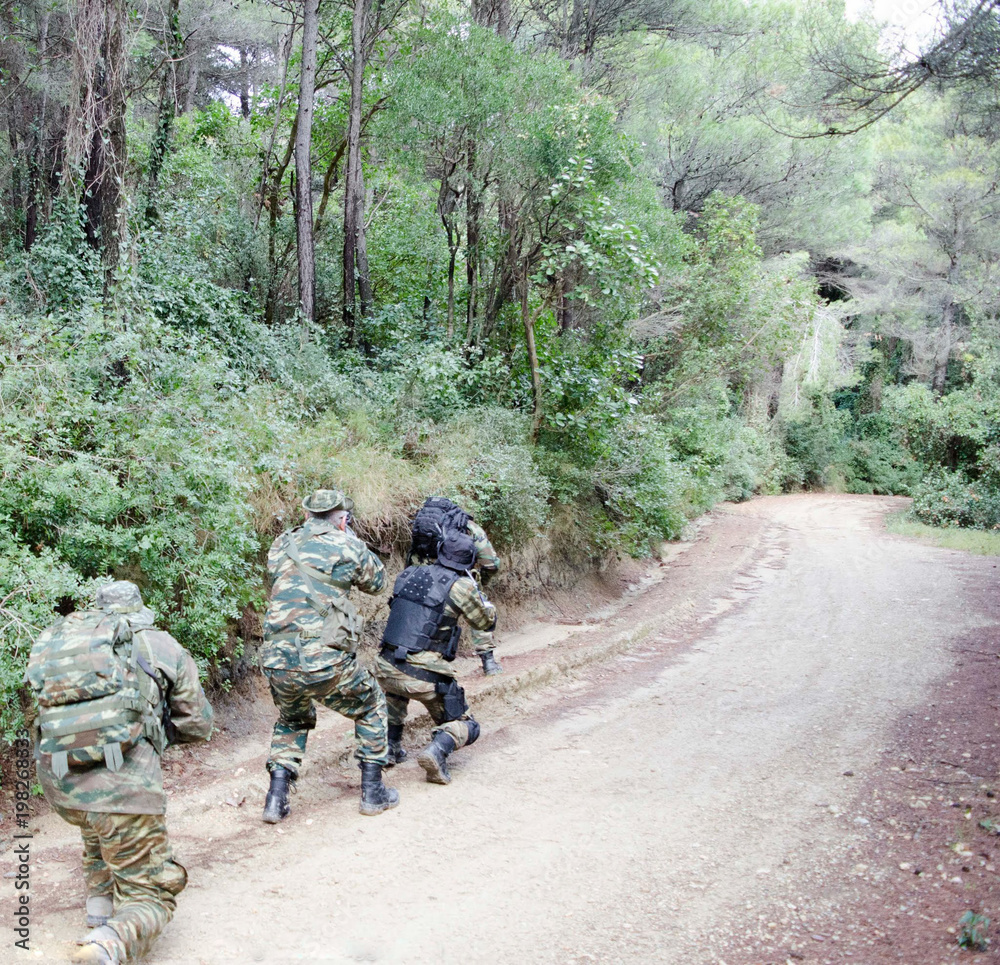 soldier patrol in forest