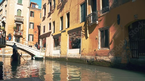 Venetian chanal with gondola in Venice, Italy