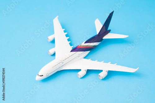 Airplane model on blue color background
