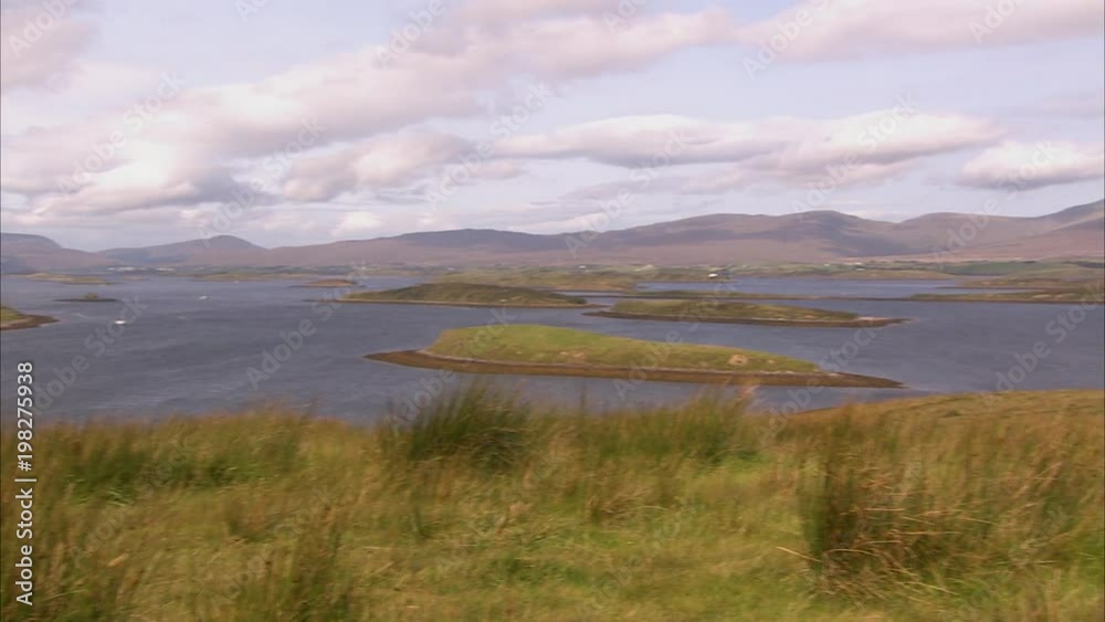 A peaceful ocean in Ireland with small islands in between. A peaceful ocean in Ireland with small islands in between.