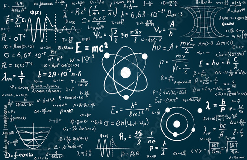 Blackboard inscribed with scientific formulas and calculations in physics and mathematics. Can illustrate scientific topics tied to quantum mechanics, relativity theory and any scientific calculations photo