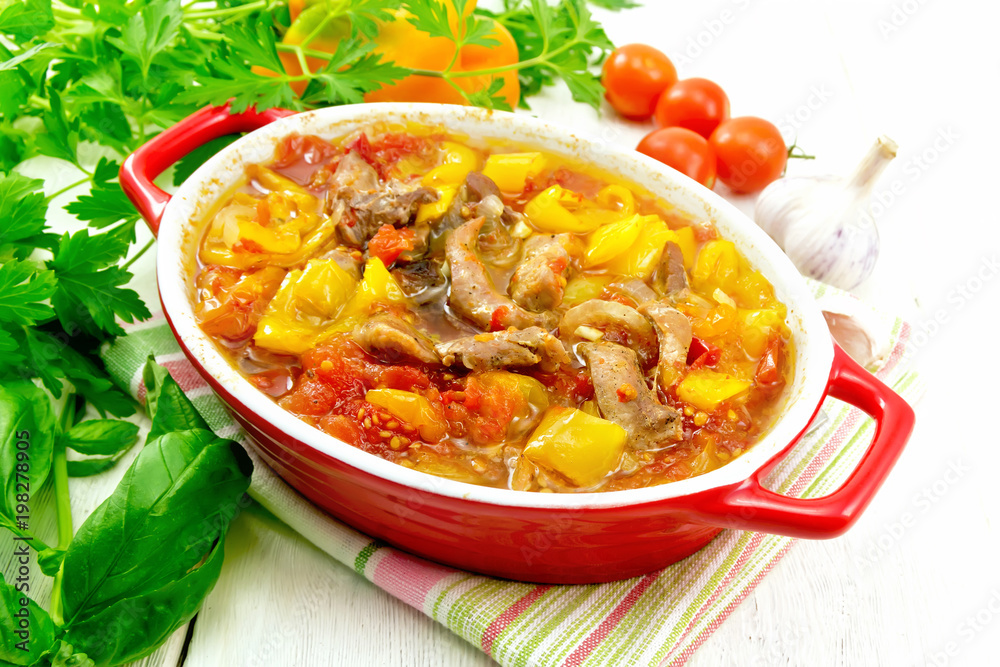 Ragout of meat and vegetables in brazier on napkin Ragout of meat and vegetables in brazier on napkin