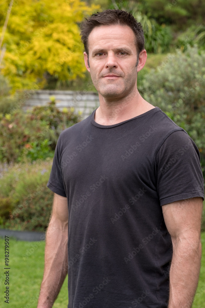 headshot in garden headshot in garden