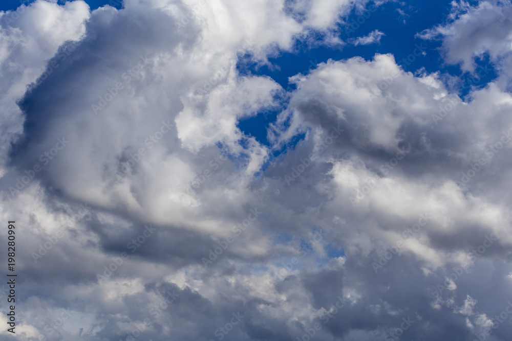 Fototapeta premium Clouds moving on a blue sky cloudscape